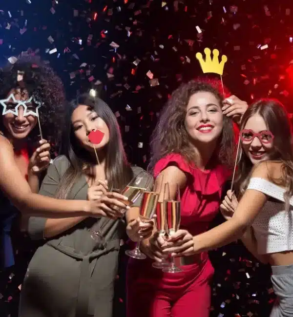 Image showing guests enjoying a photo booth at a wedding.